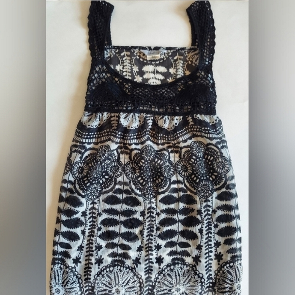 Sheer crocheted black and white sleeveless top by Speechless